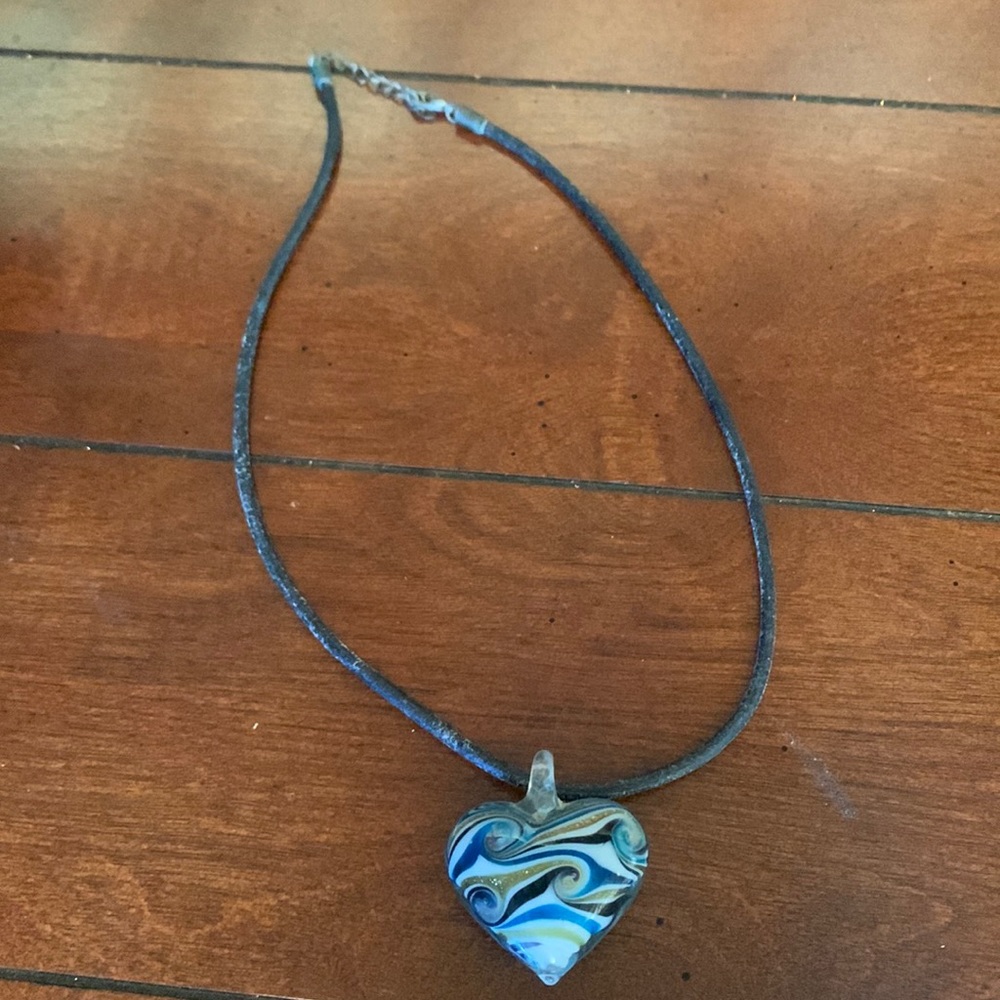Multicolored glass heart pendant on cord